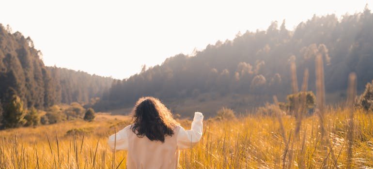 A woman running in the fields