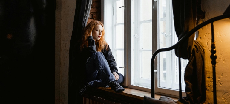 Person sitting in a peaceful room.